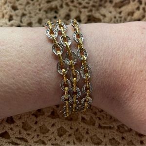 Sterling silver and gold colored bracelet.